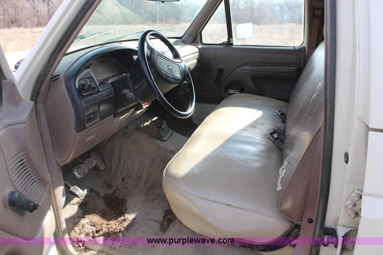 image for item I2463 1995 Ford F350 XL Crew Cab flatbed pickup truck