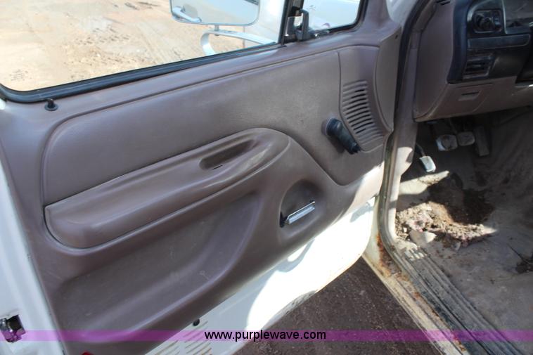 image for item I2463 1995 Ford F350 XL Crew Cab flatbed pickup truck