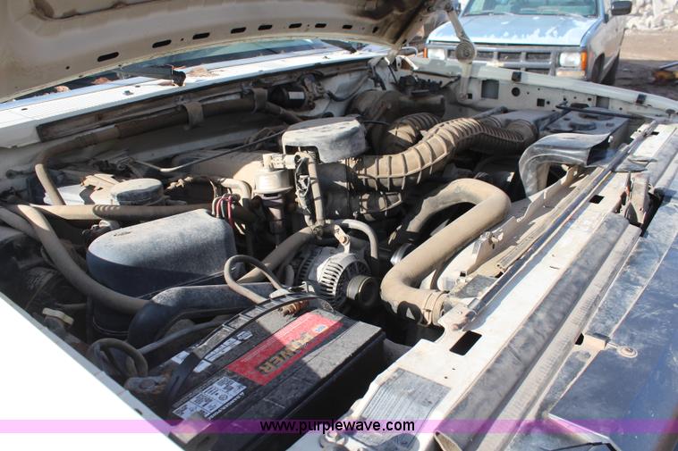 image for item I2463 1995 Ford F350 XL Crew Cab flatbed pickup truck