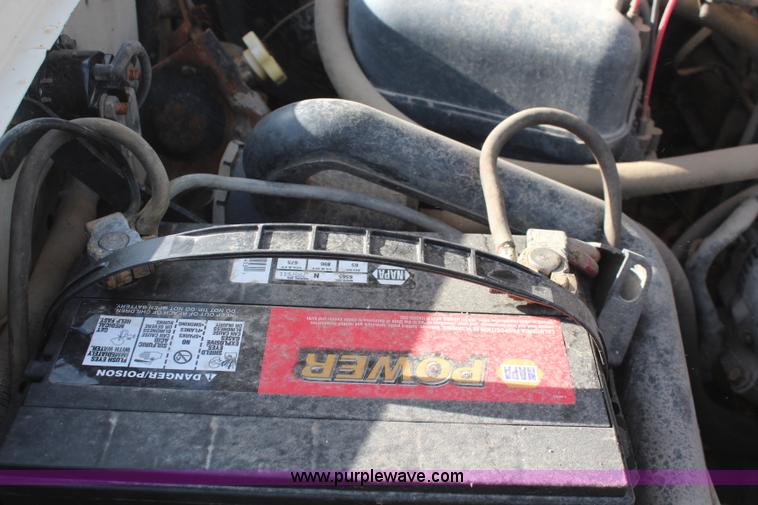 image for item I2463 1995 Ford F350 XL Crew Cab flatbed pickup truck