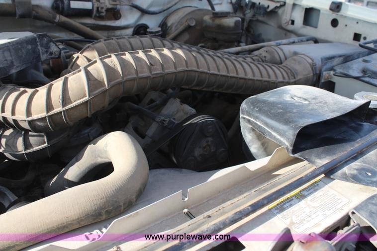 image for item I2463 1995 Ford F350 XL Crew Cab flatbed pickup truck