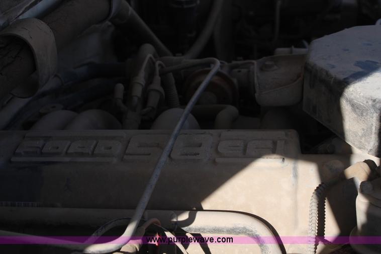 image for item I2463 1995 Ford F350 XL Crew Cab flatbed pickup truck