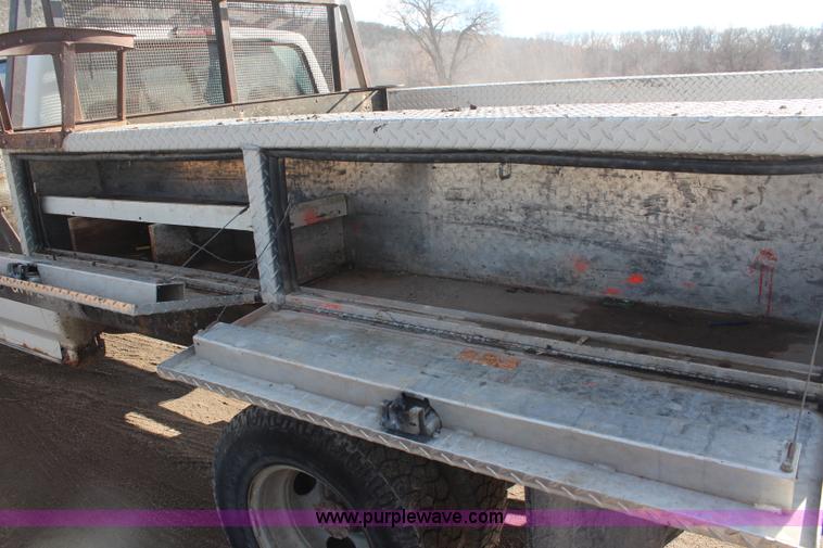 image for item I2463 1995 Ford F350 XL Crew Cab flatbed pickup truck