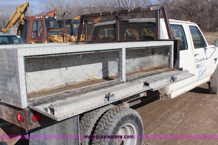 image for item I2463 1995 Ford F350 XL Crew Cab flatbed pickup truck