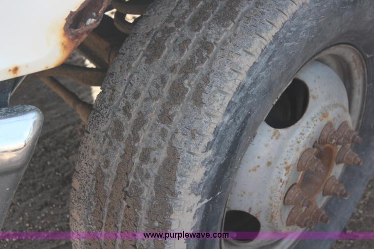 image for item I2463 1995 Ford F350 XL Crew Cab flatbed pickup truck