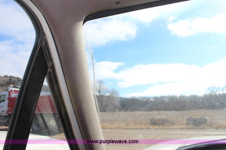 image for item I2463 1995 Ford F350 XL Crew Cab flatbed pickup truck