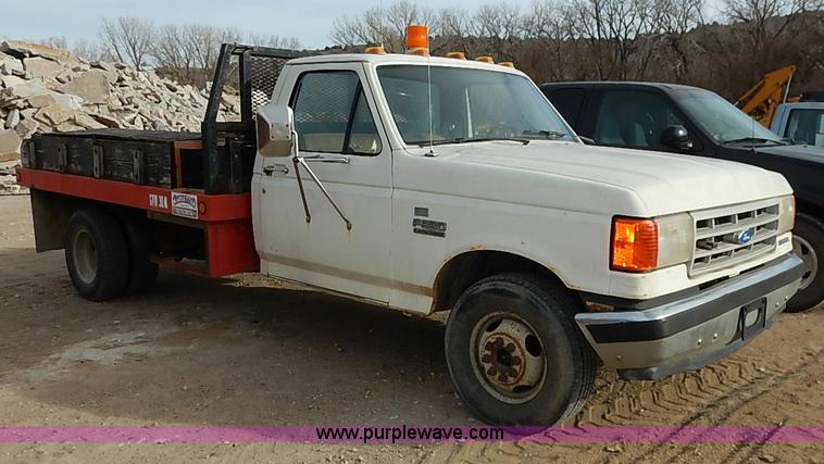 image for item I2489 1991 Ford F350 Custom flatbed pickup truck