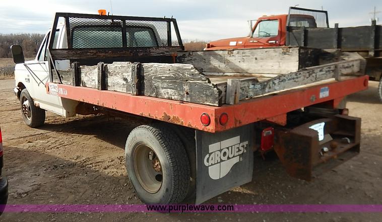 image for item I2489 1991 Ford F350 Custom flatbed pickup truck