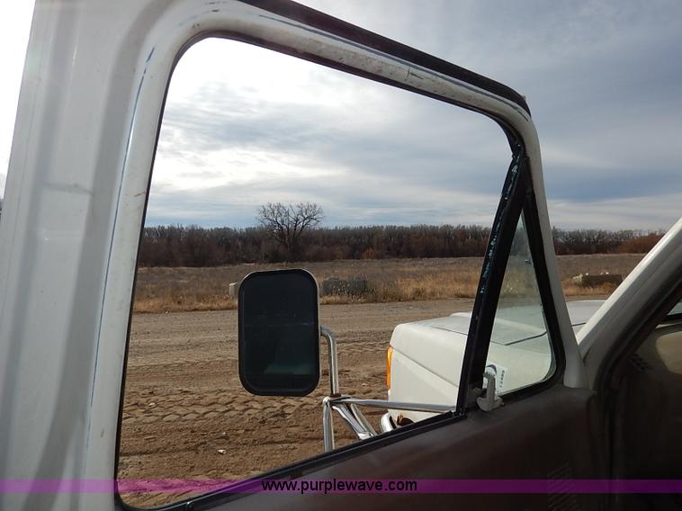 image for item I2489 1991 Ford F350 Custom flatbed pickup truck