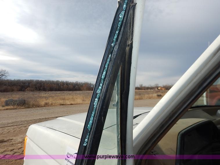 image for item I2489 1991 Ford F350 Custom flatbed pickup truck