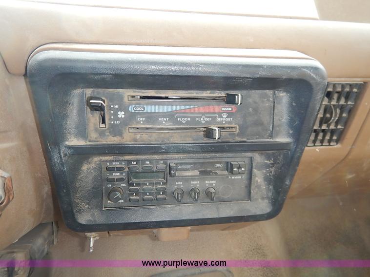 image for item I2489 1991 Ford F350 Custom flatbed pickup truck