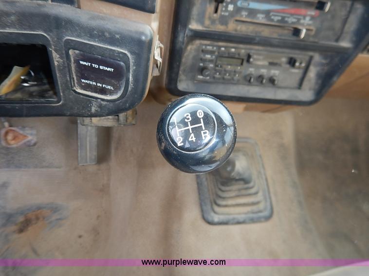 image for item I2489 1991 Ford F350 Custom flatbed pickup truck