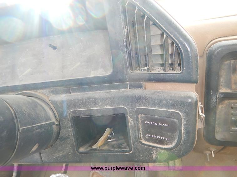 image for item I2489 1991 Ford F350 Custom flatbed pickup truck