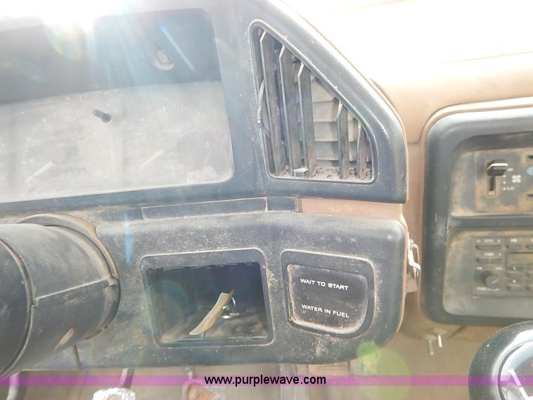 image for item I2489 1991 Ford F350 Custom flatbed pickup truck