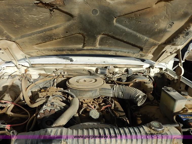 image for item I2489 1991 Ford F350 Custom flatbed pickup truck