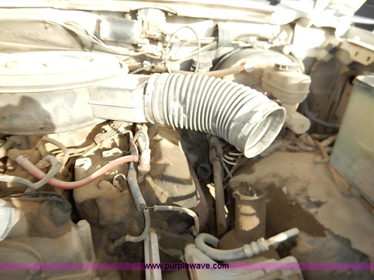 image for item I2489 1991 Ford F350 Custom flatbed pickup truck