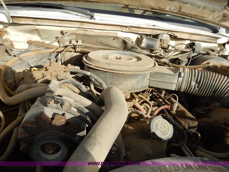 image for item I2489 1991 Ford F350 Custom flatbed pickup truck