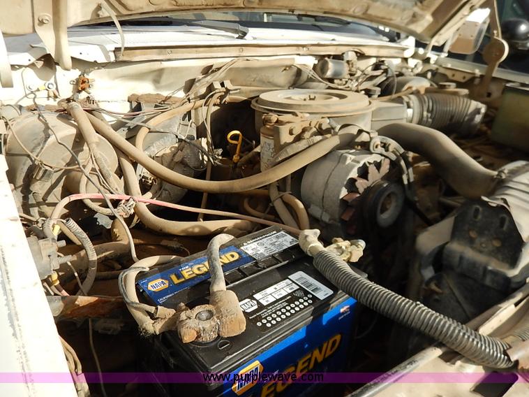 image for item I2489 1991 Ford F350 Custom flatbed pickup truck