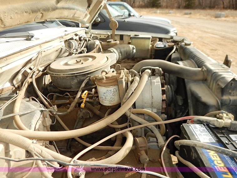 image for item I2489 1991 Ford F350 Custom flatbed pickup truck