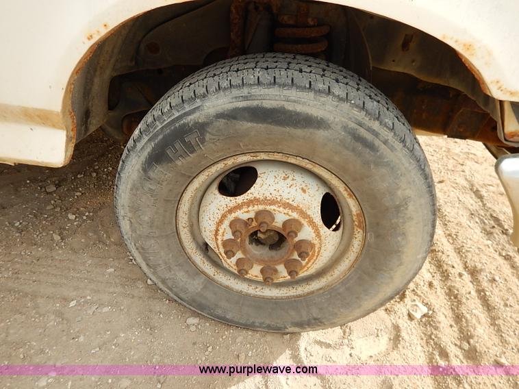 image for item I2489 1991 Ford F350 Custom flatbed pickup truck