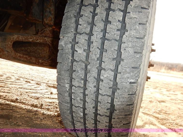 image for item I2489 1991 Ford F350 Custom flatbed pickup truck