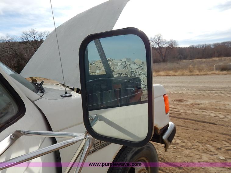 image for item I2489 1991 Ford F350 Custom flatbed pickup truck