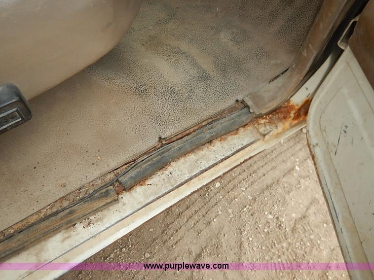 image for item I2489 1991 Ford F350 Custom flatbed pickup truck