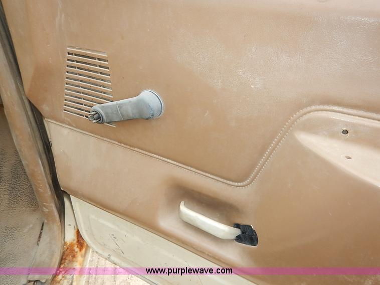 image for item I2489 1991 Ford F350 Custom flatbed pickup truck