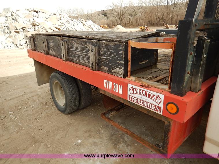 image for item I2489 1991 Ford F350 Custom flatbed pickup truck