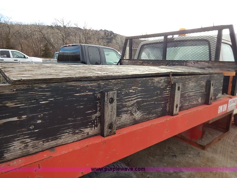 image for item I2489 1991 Ford F350 Custom flatbed pickup truck
