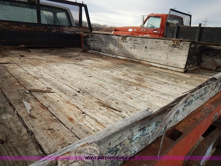 image for item I2489 1991 Ford F350 Custom flatbed pickup truck
