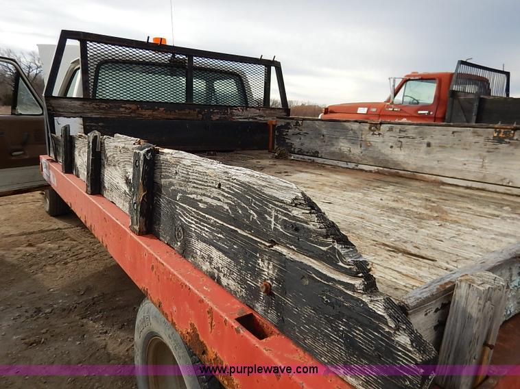 image for item I2489 1991 Ford F350 Custom flatbed pickup truck