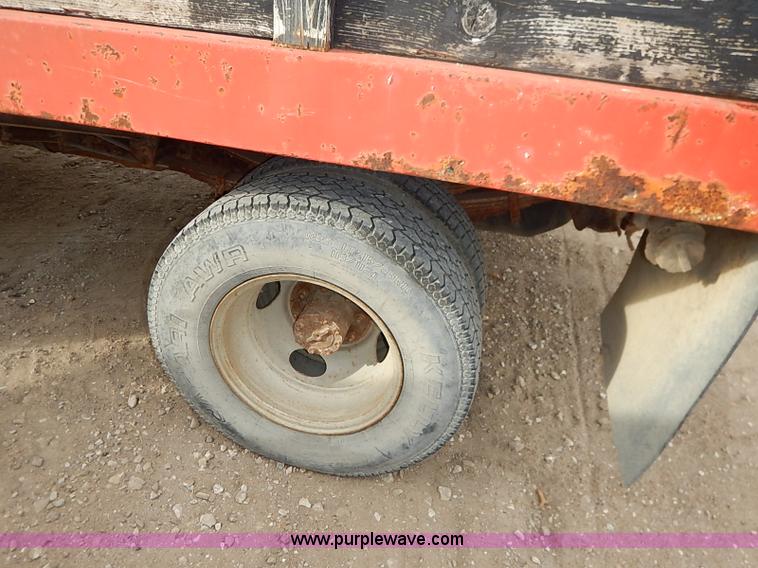 image for item I2489 1991 Ford F350 Custom flatbed pickup truck