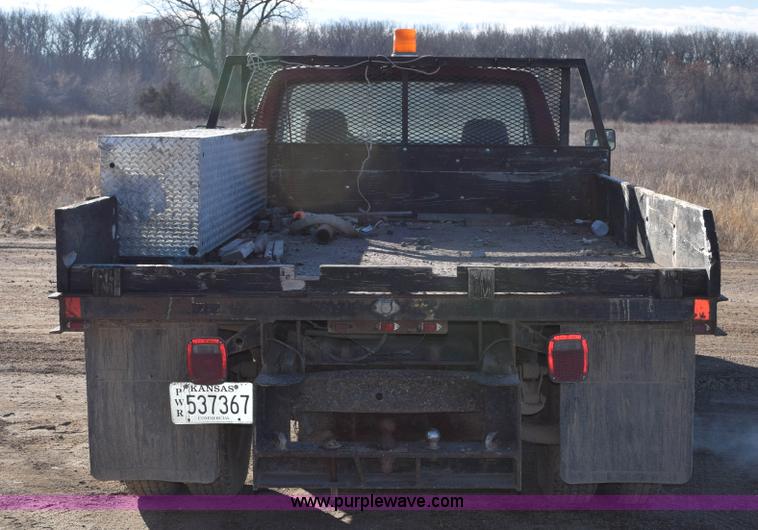 image for item J1240 1994 Ford F350 Super Duty XLT flatbed truck
