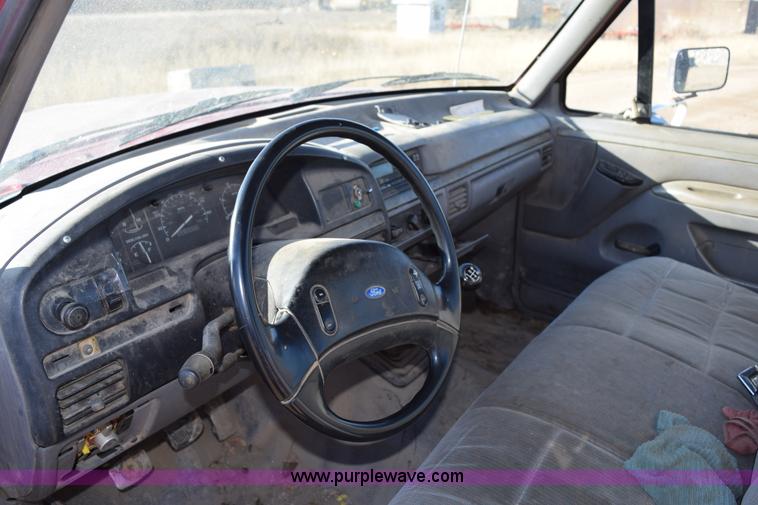 image for item J1240 1994 Ford F350 Super Duty XLT flatbed truck