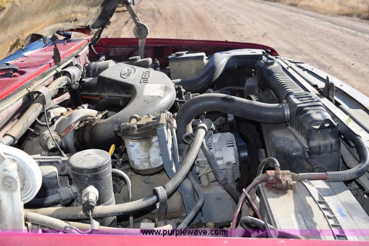 image for item J1240 1994 Ford F350 Super Duty XLT flatbed truck