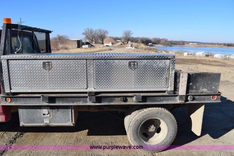 image for item J1240 1994 Ford F350 Super Duty XLT flatbed truck