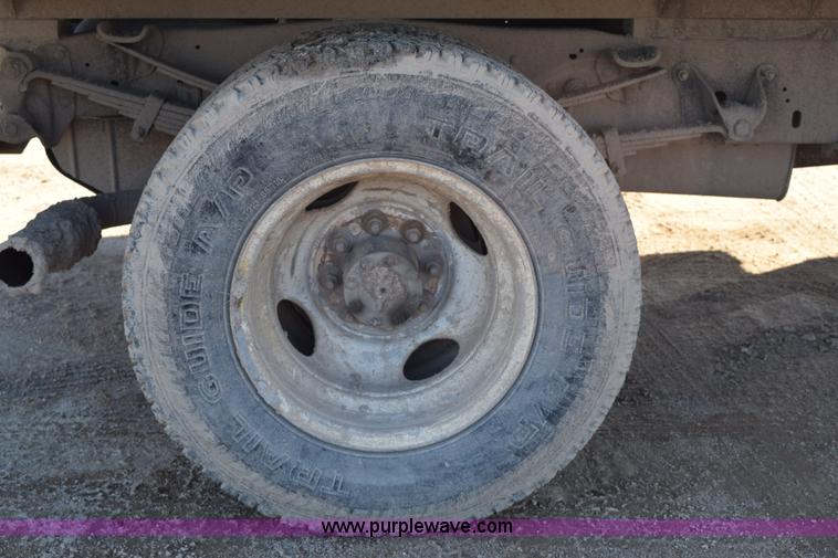 image for item J1240 1994 Ford F350 Super Duty XLT flatbed truck