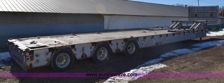 image for item E6069 2000 shop built triple axle lowboy trailer