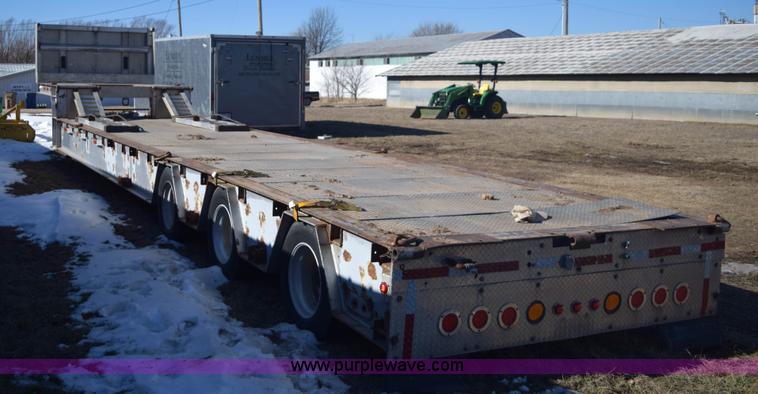 image for item E6069 2000 shop built triple axle lowboy trailer