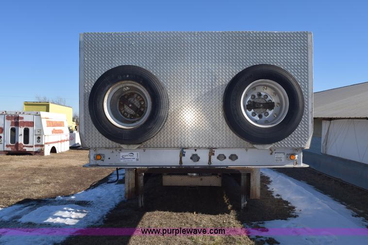 image for item E6069 2000 shop built triple axle lowboy trailer