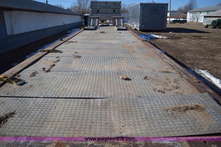 image for item E6069 2000 shop built triple axle lowboy trailer