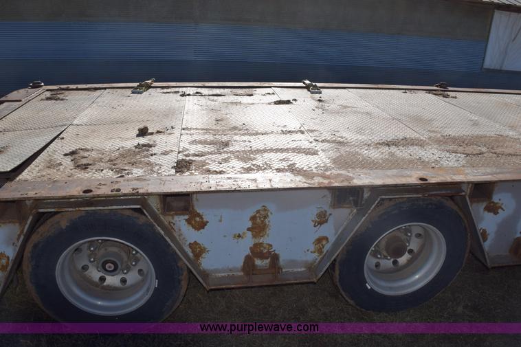 image for item E6069 2000 shop built triple axle lowboy trailer