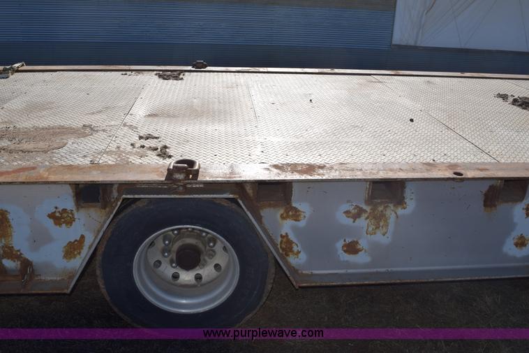 image for item E6069 2000 shop built triple axle lowboy trailer
