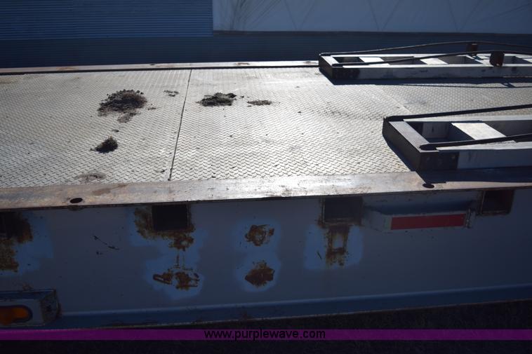 image for item E6069 2000 shop built triple axle lowboy trailer