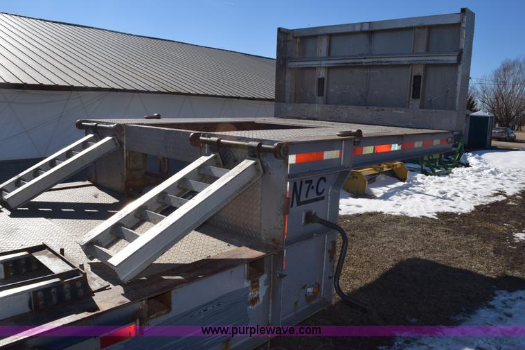 image for item E6069 2000 shop built triple axle lowboy trailer