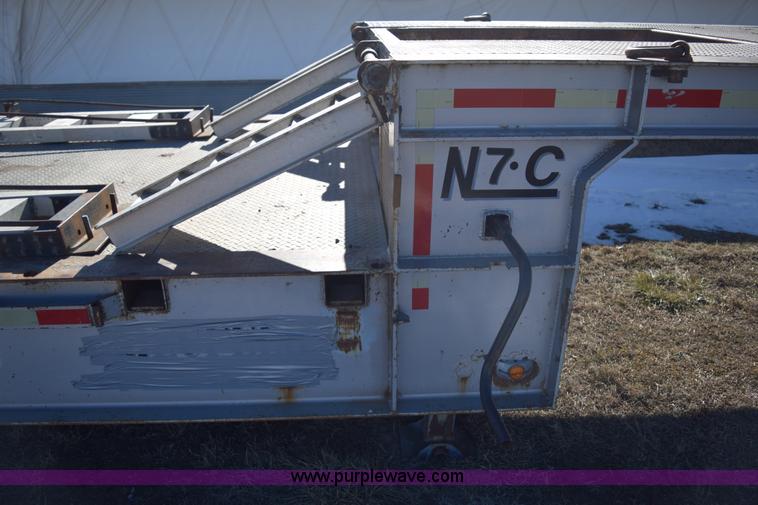 image for item E6069 2000 shop built triple axle lowboy trailer