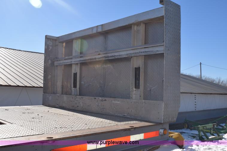 image for item E6069 2000 shop built triple axle lowboy trailer