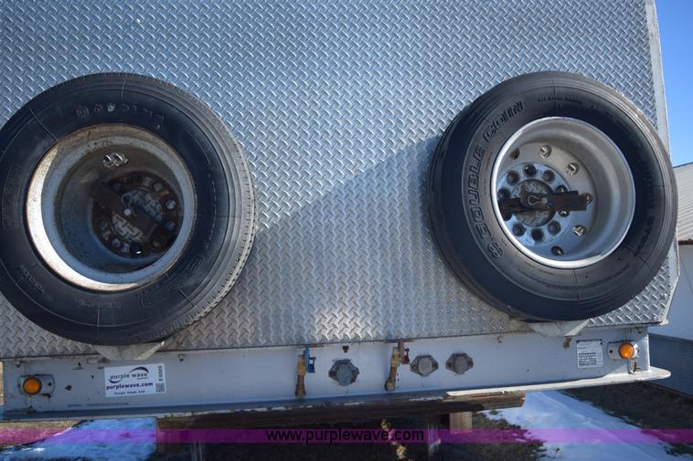 image for item E6069 2000 shop built triple axle lowboy trailer