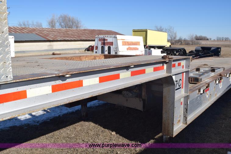 image for item E6069 2000 shop built triple axle lowboy trailer